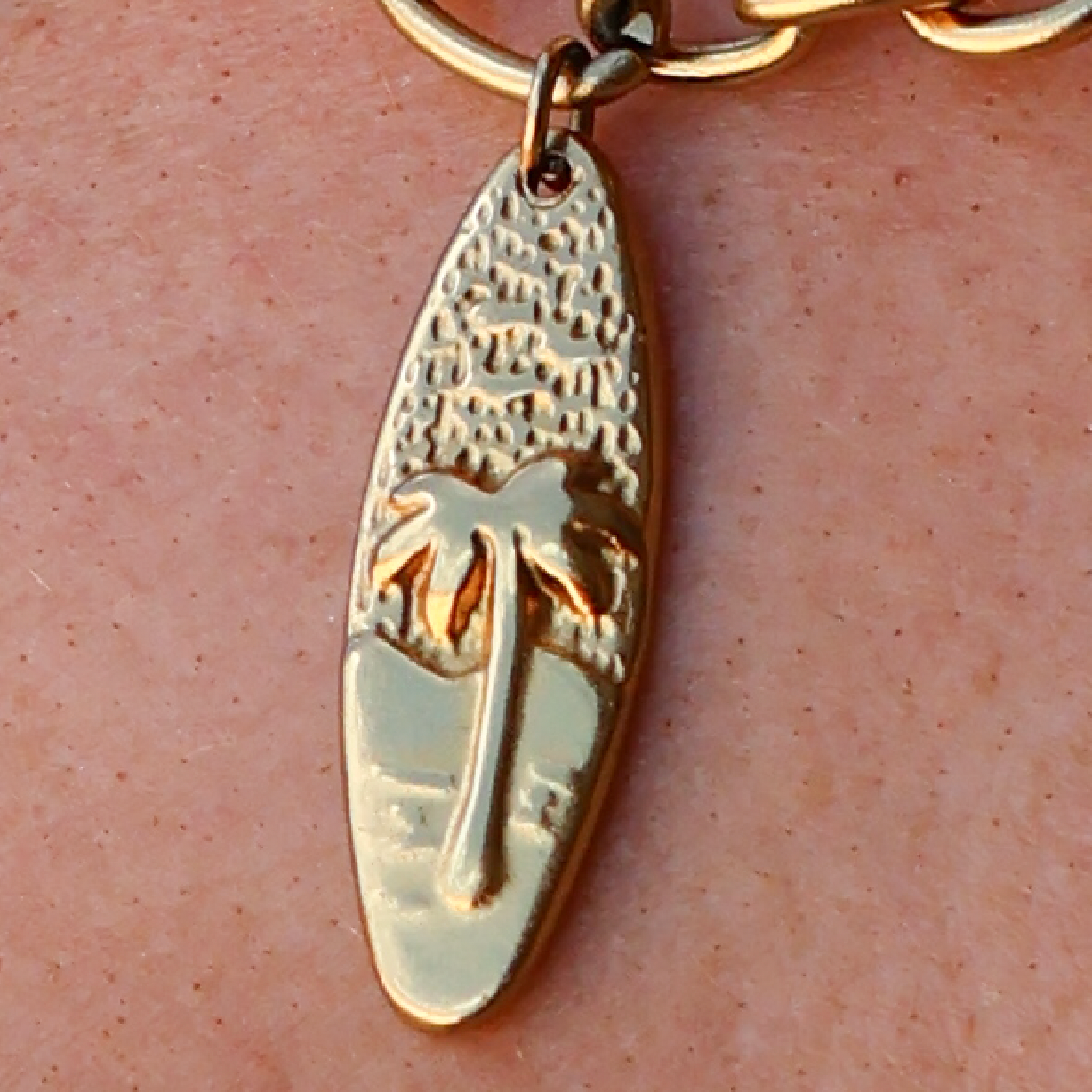 Gold waterproof surfboard charm