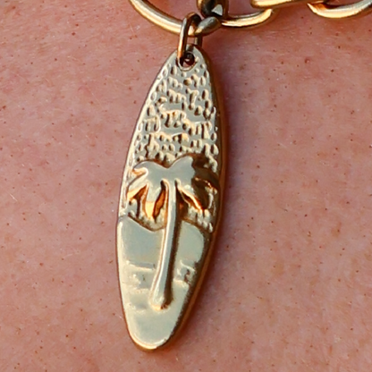 Gold waterproof surfboard charm